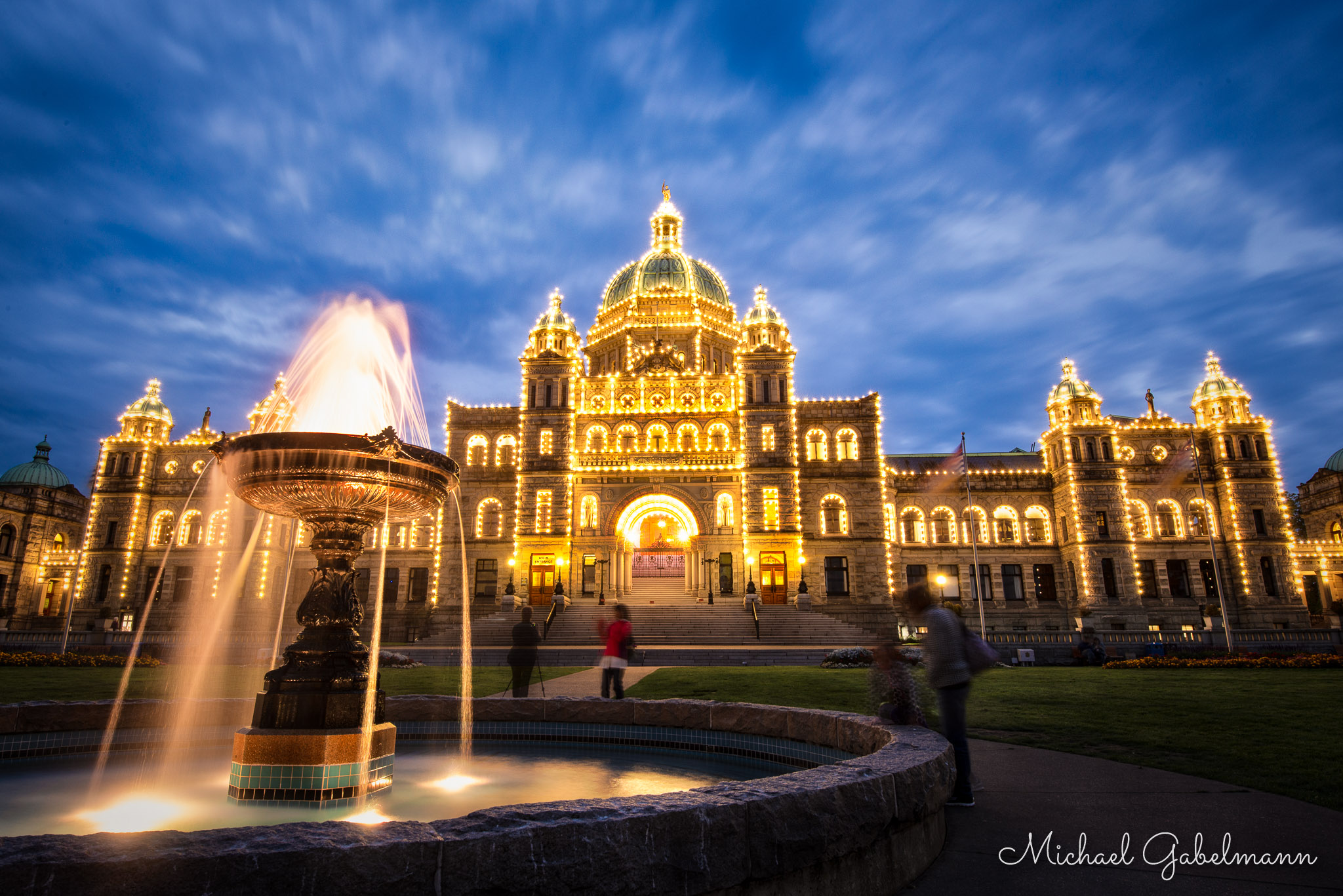 Fountain and B.C.'s Legislature lit up at night