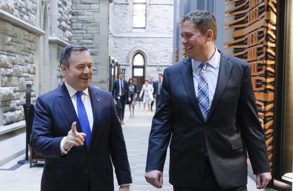 Jason Kenney walking and talking with Andrew Scheer