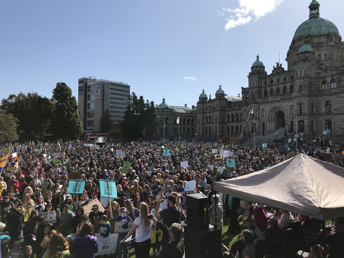 A group of youth protest outside the B.C. Legislature